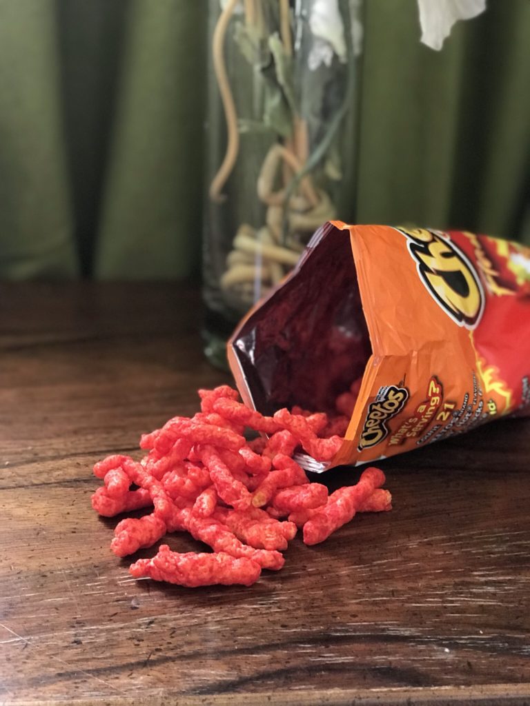 Poured out bag of Flaming Hot Cheetos